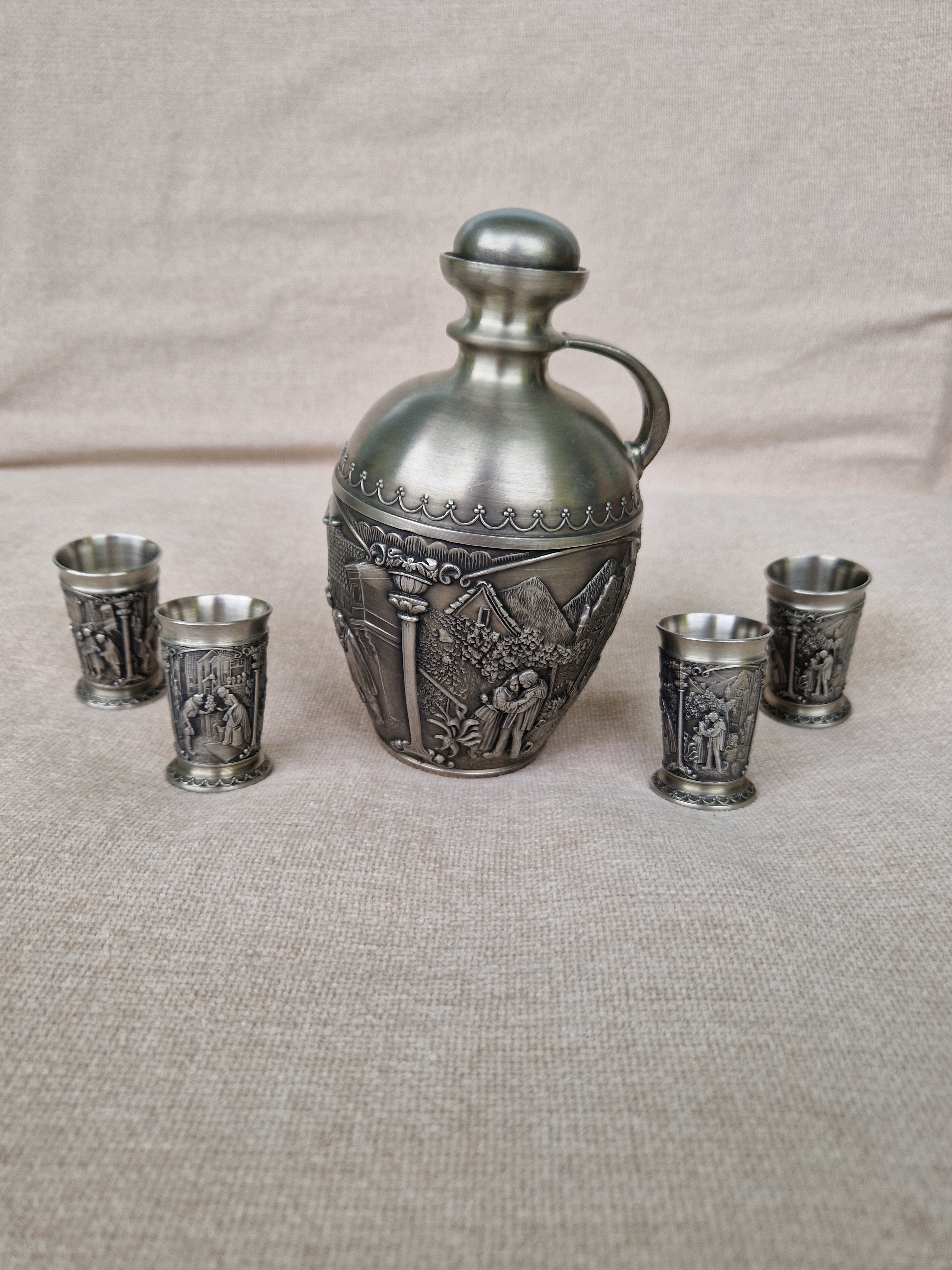 Vintage Pewter (Zinn) Schnapps Set — Jug Decanter & 4 Shot Cups | Alpine Figural Relief Decoration