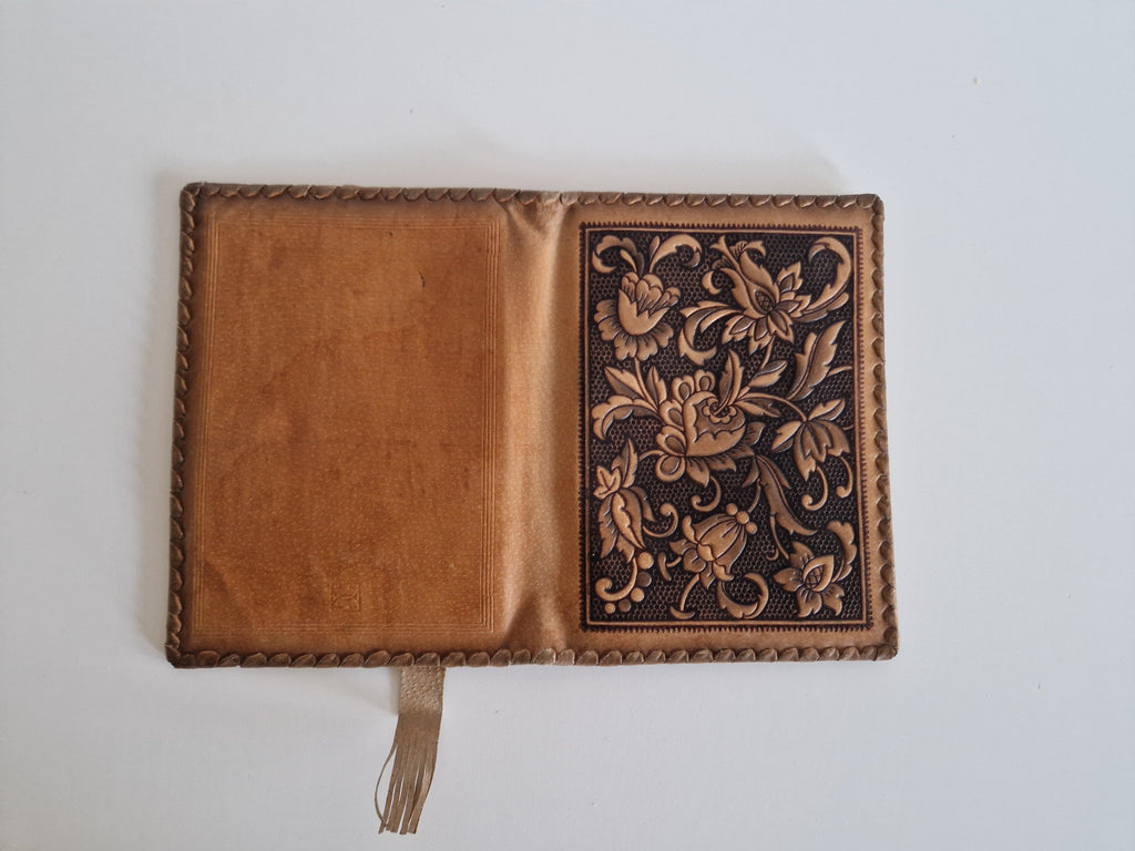 Vintage Hand-Tooled Leather Book Cover with Carved Floral Design & Tassel Closure