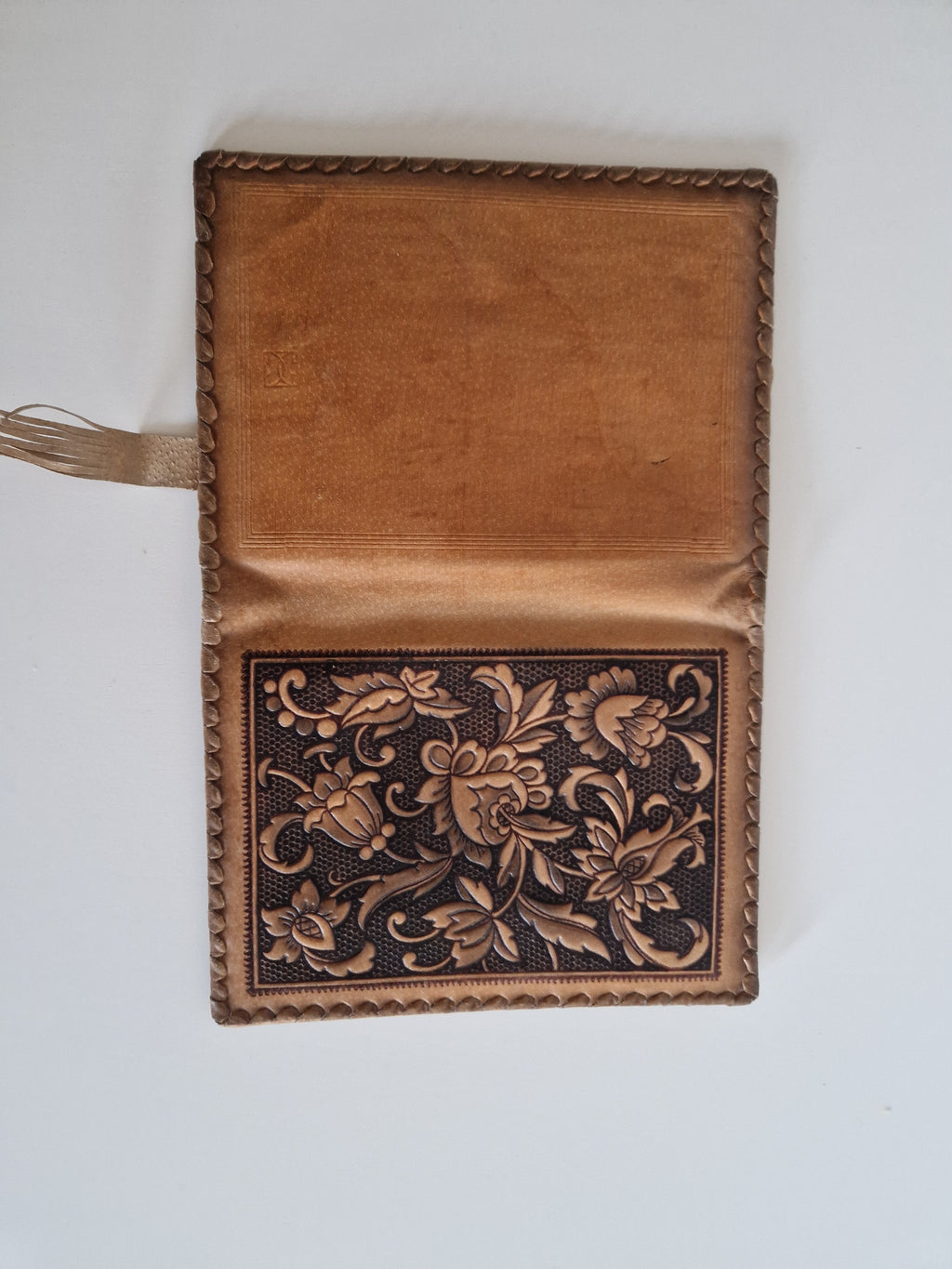 Vintage Hand-Tooled Leather Book Cover with Carved Floral Design & Tassel Closure
