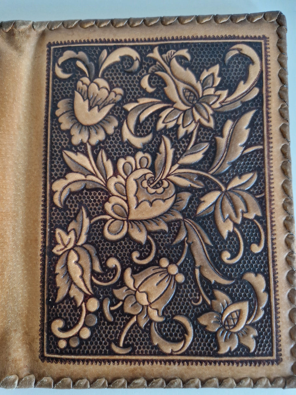 Vintage Hand-Tooled Leather Book Cover with Carved Floral Design & Tassel Closure