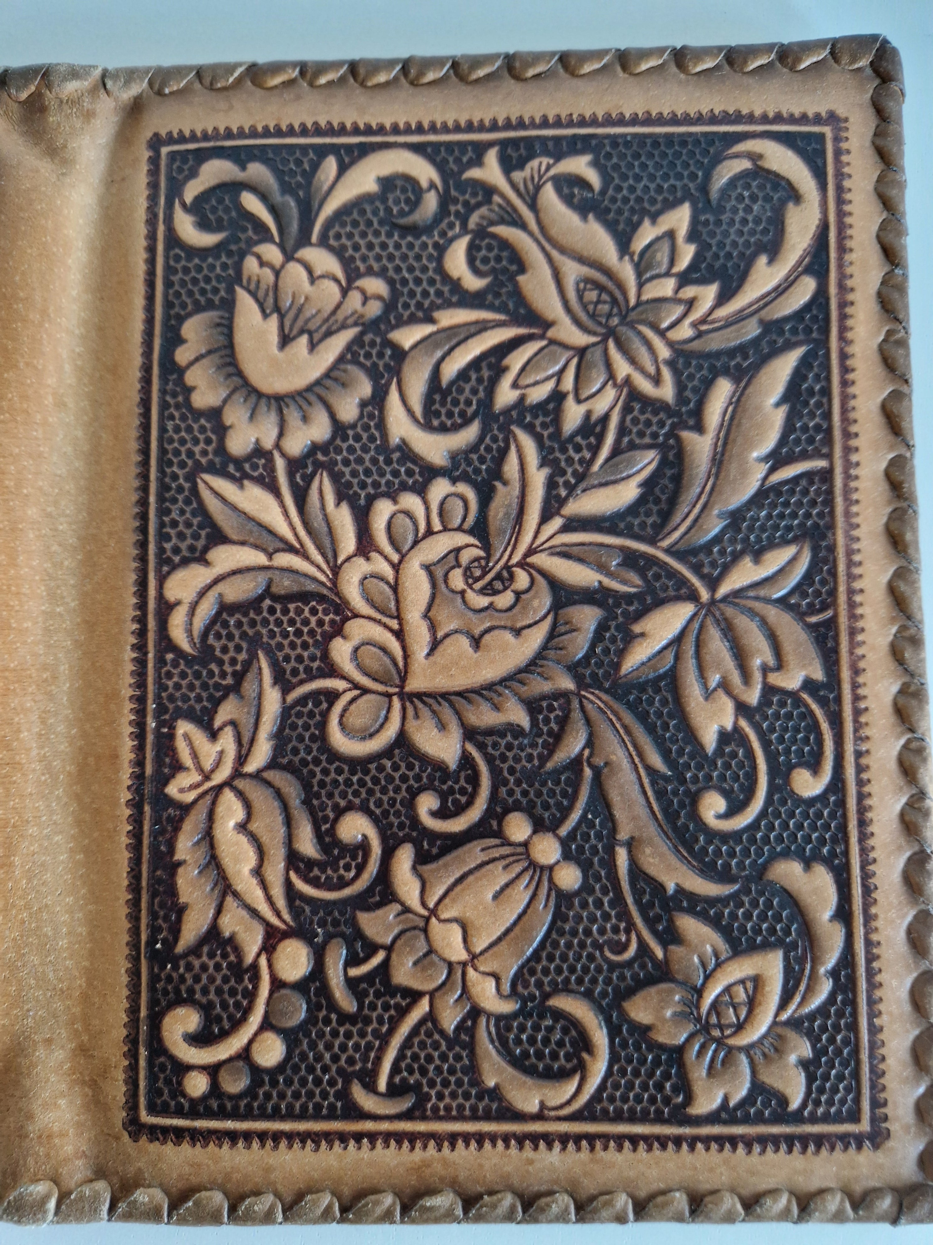 Vintage Hand-Tooled Leather Book Cover with Carved Floral Design & Tassel Closure