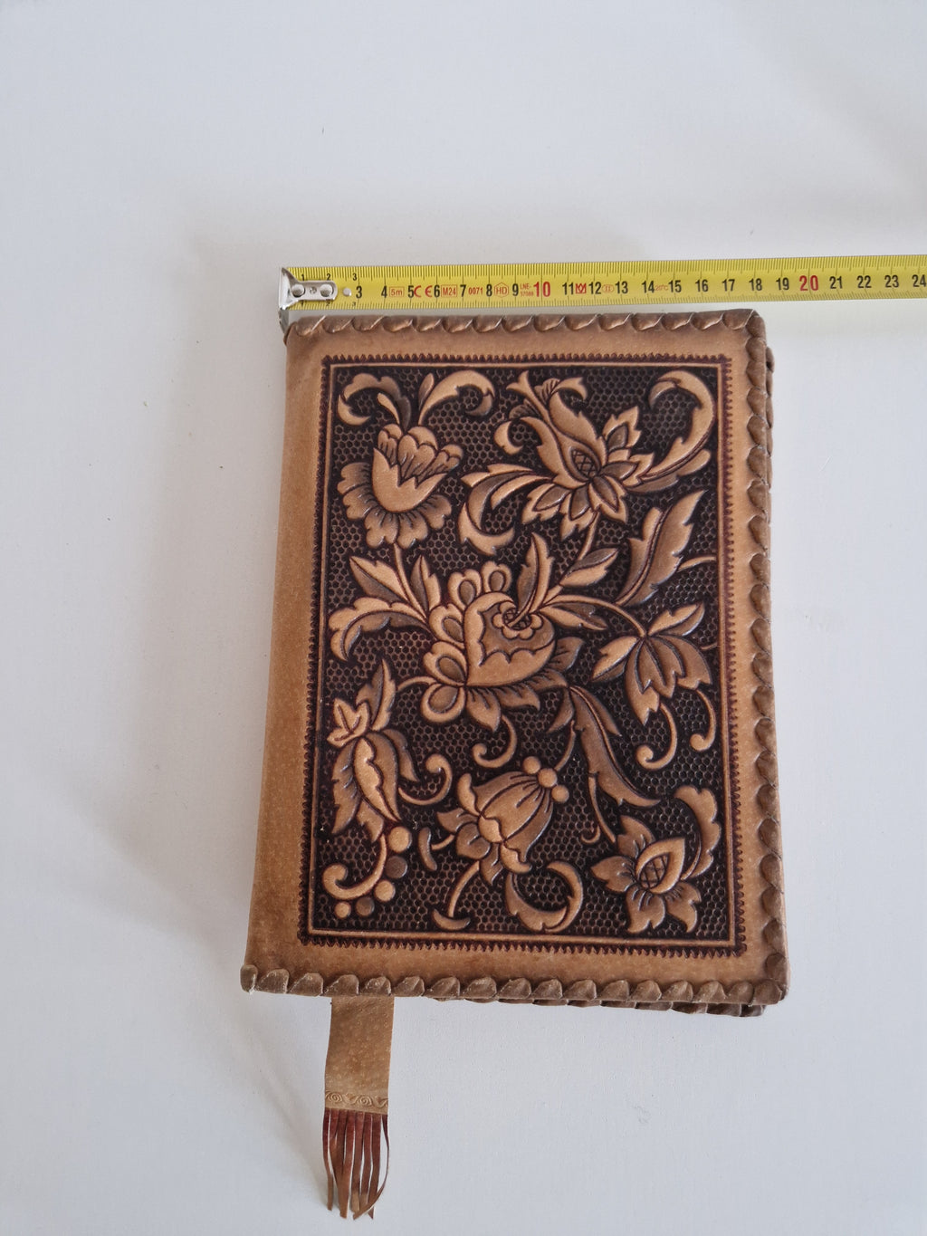 Vintage Hand-Tooled Leather Book Cover with Carved Floral Design & Tassel Closure