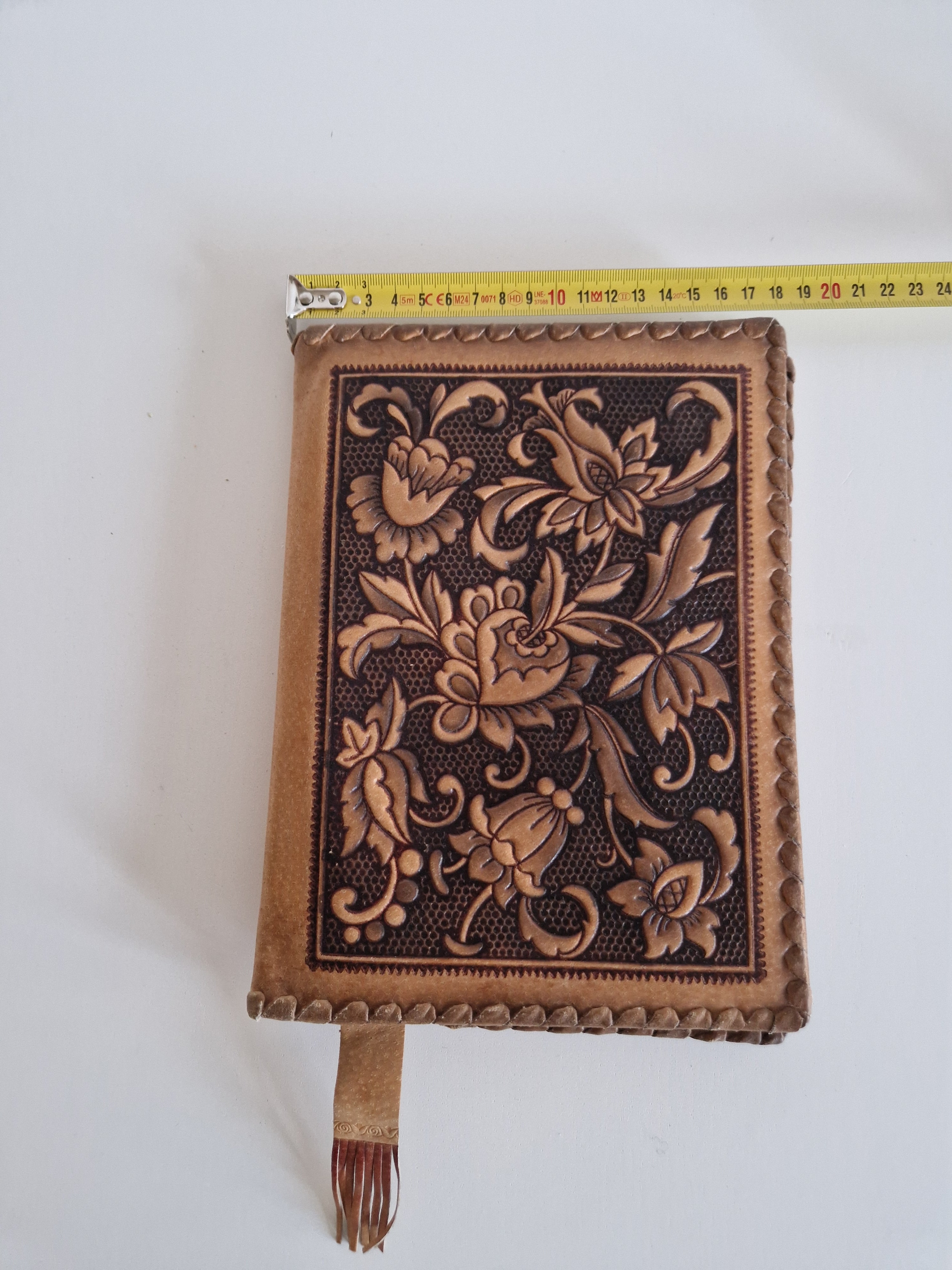 Vintage Hand-Tooled Leather Book Cover with Carved Floral Design & Tassel Closure