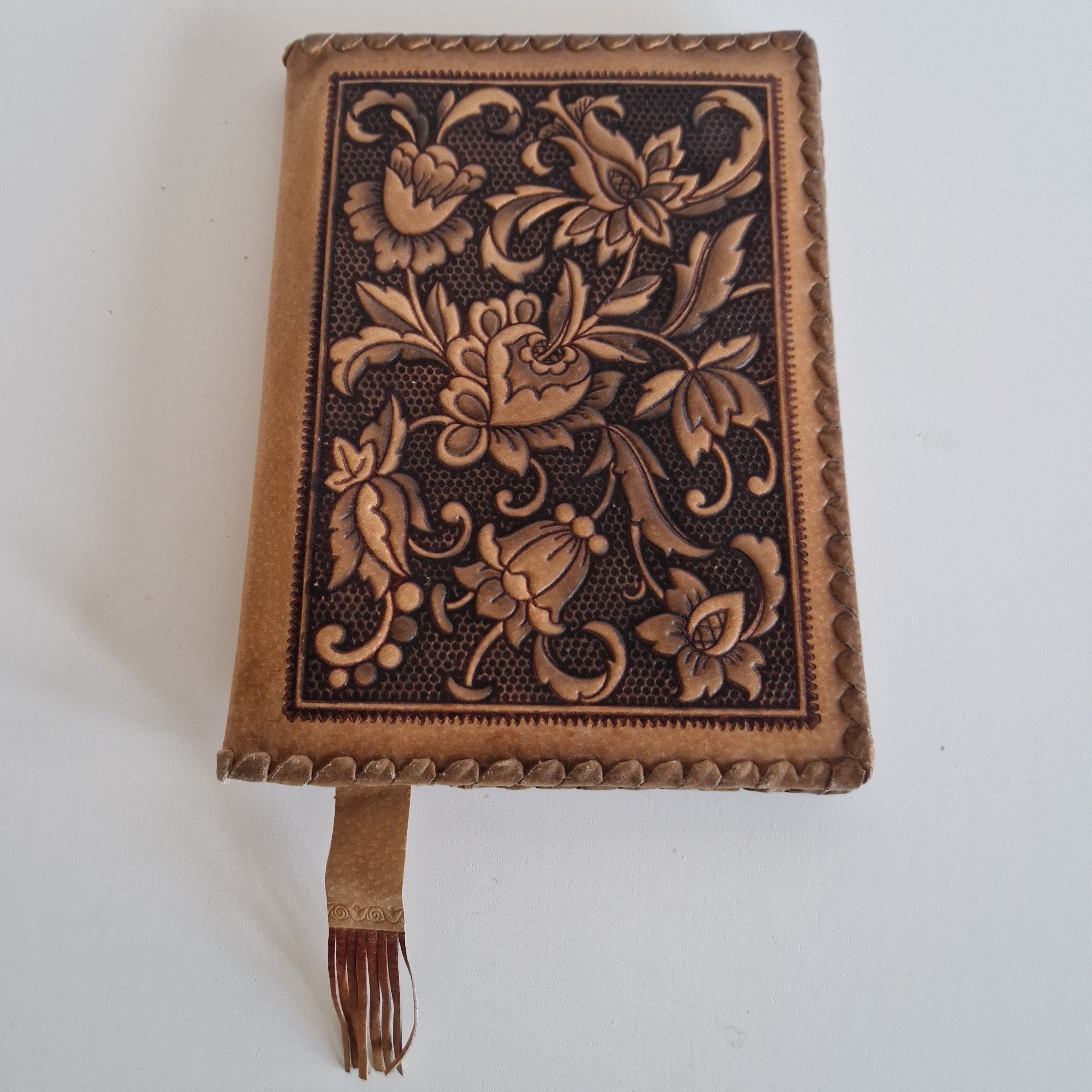 Vintage Hand-Tooled Leather Book Cover with Carved Floral Design & Tassel Closure