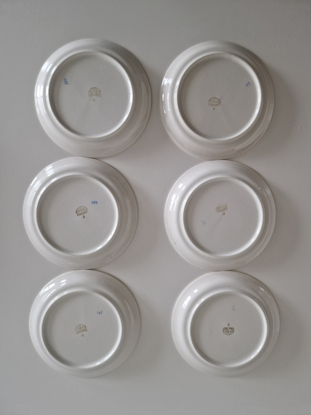 Reverse of all 6 Ditmar Urbach plates showing backstamps