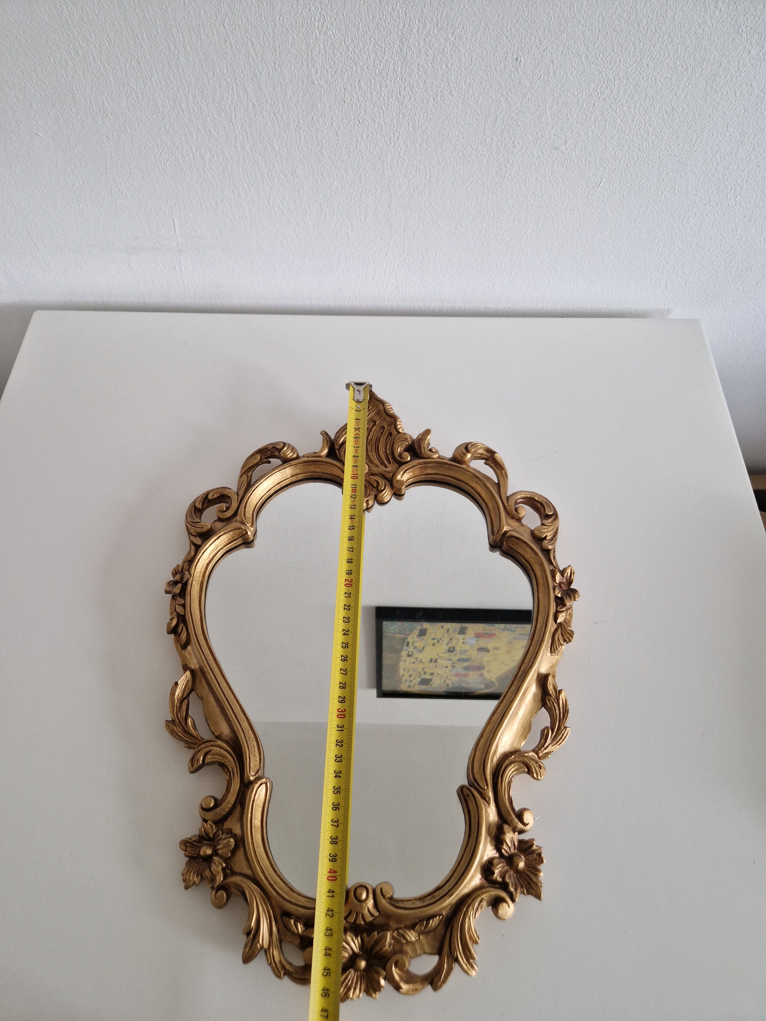 Vintage gilt Rococo mirror measured at approximately 45 cm tall