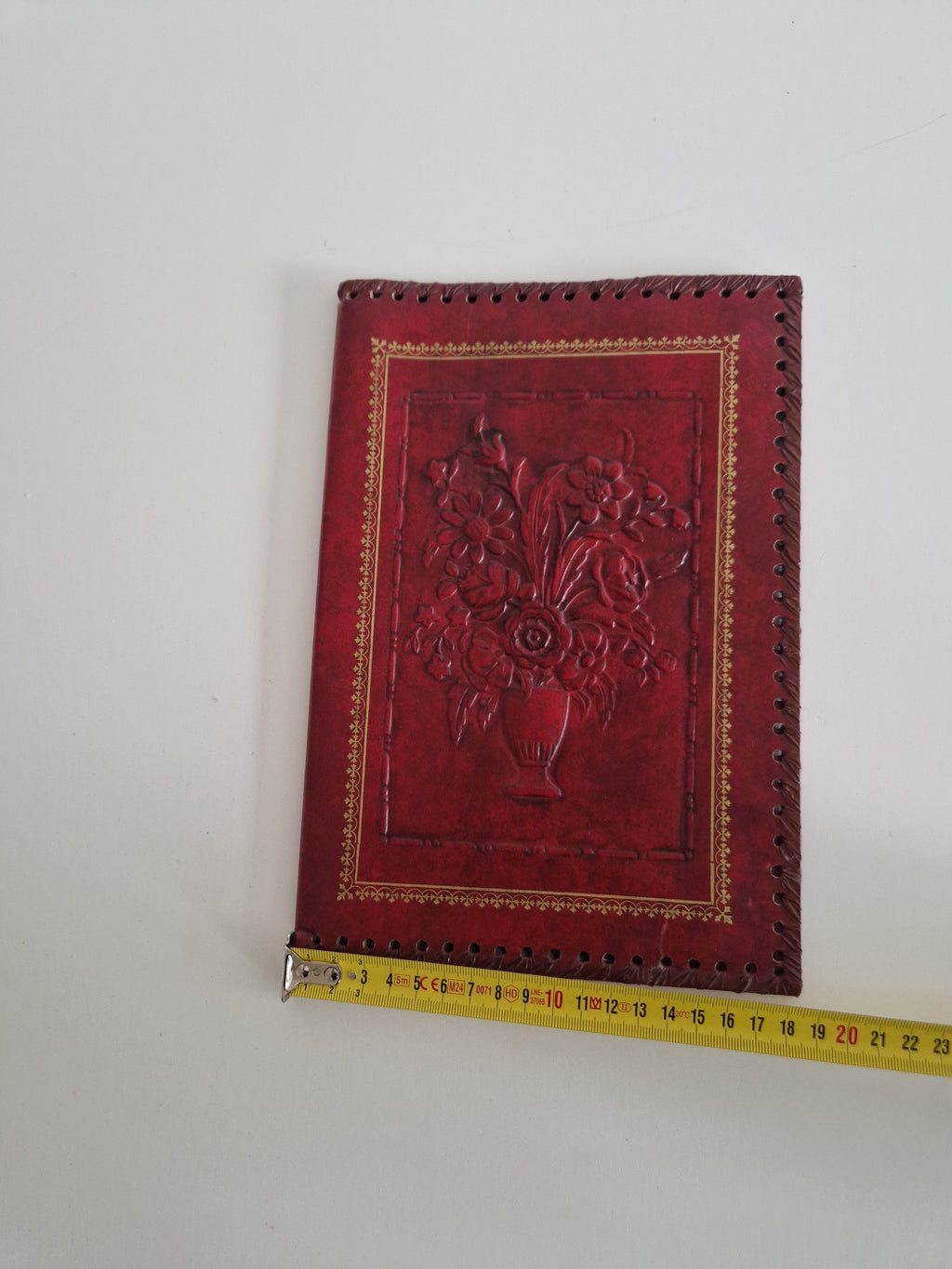 Vintage Hand-Tooled Crimson Leather Book / Journal Cover – Embossed Floral Bouquet & Gold Border | Whipstitch Edge | 20 × 14 cm