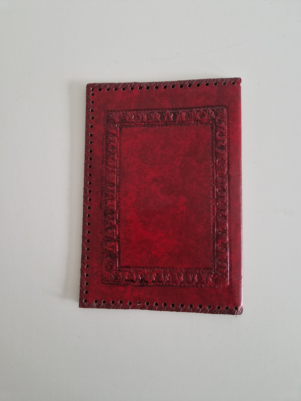 Vintage Hand-Tooled Crimson Leather Book / Journal Cover – Embossed Floral Bouquet & Gold Border | Whipstitch Edge | 20 × 14 cm