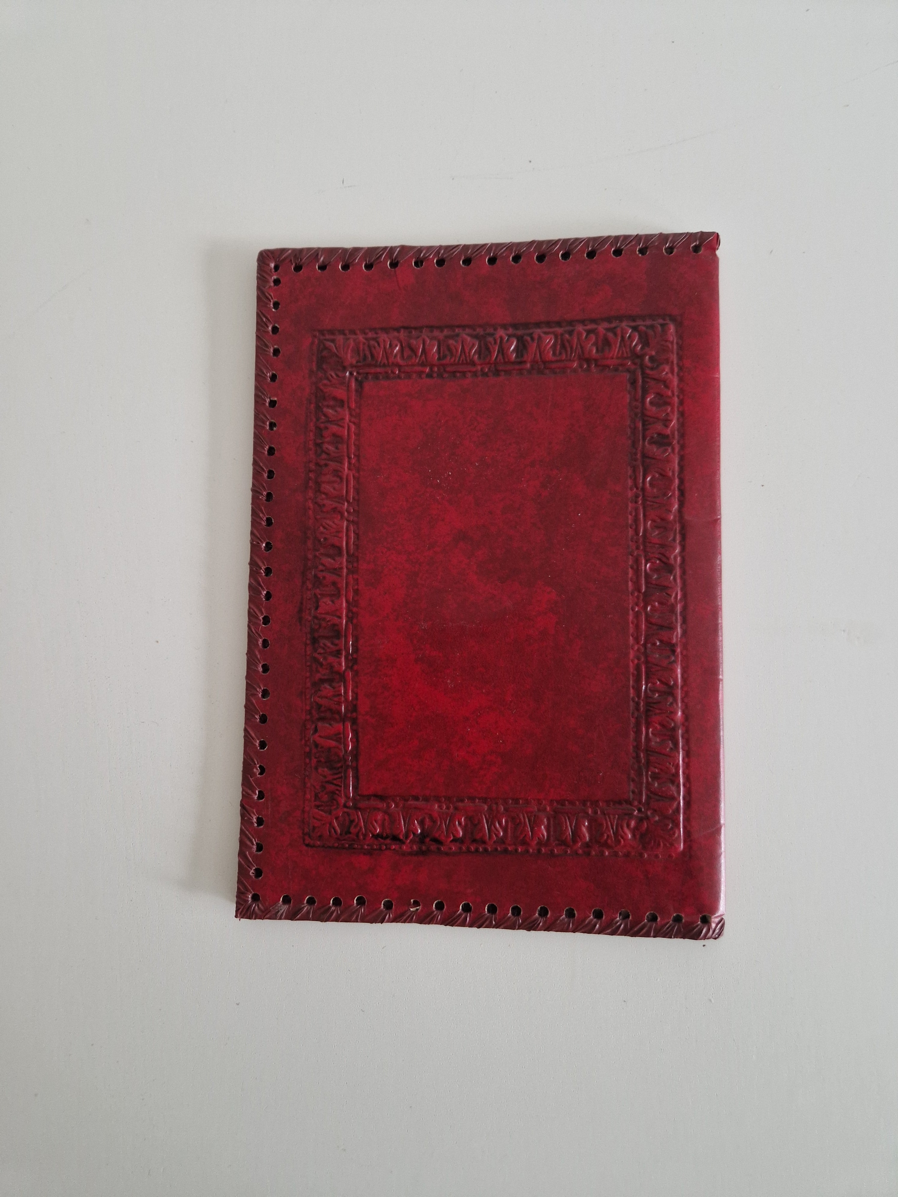 Vintage Hand-Tooled Crimson Leather Book / Journal Cover – Embossed Floral Bouquet & Gold Border | Whipstitch Edge | 20 × 14 cm
