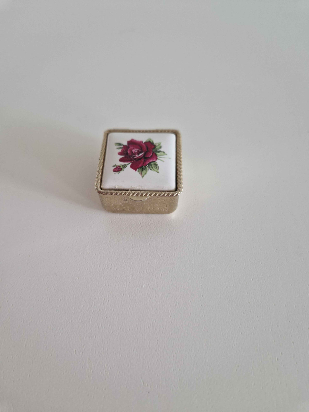 Charming Vintage Pill Box with Porcelain Rose Lid & Engraved Scrollwork