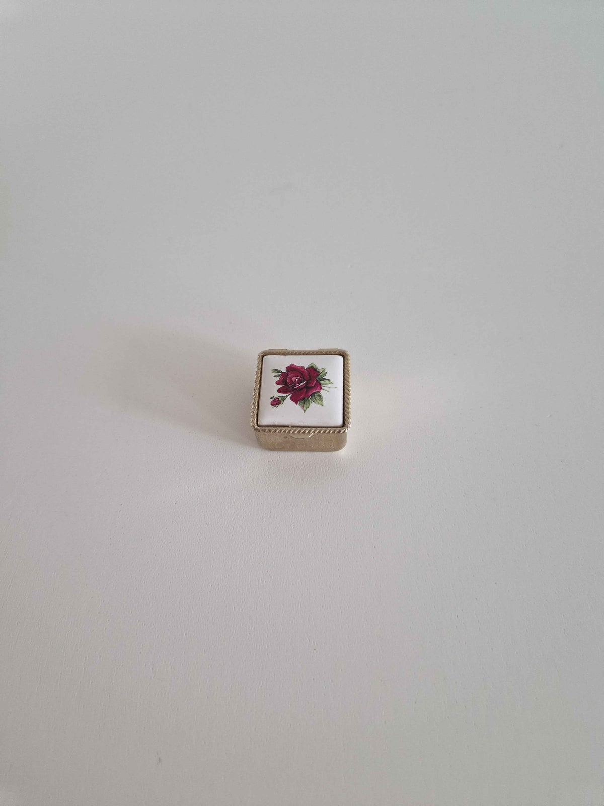 Charming Vintage Pill Box with Porcelain Rose Lid & Engraved Scrollwork