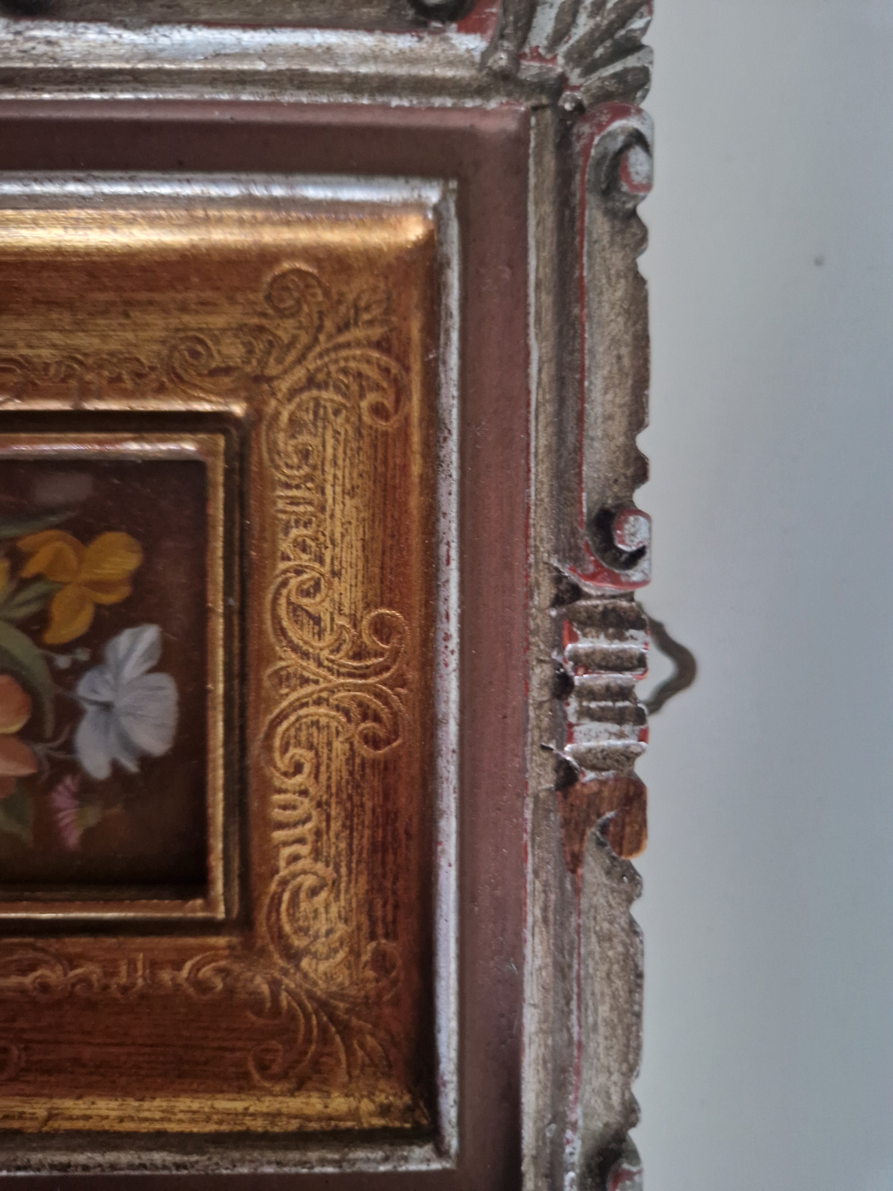 Corner detail showing D-ring hanging bracket on reverse of frame