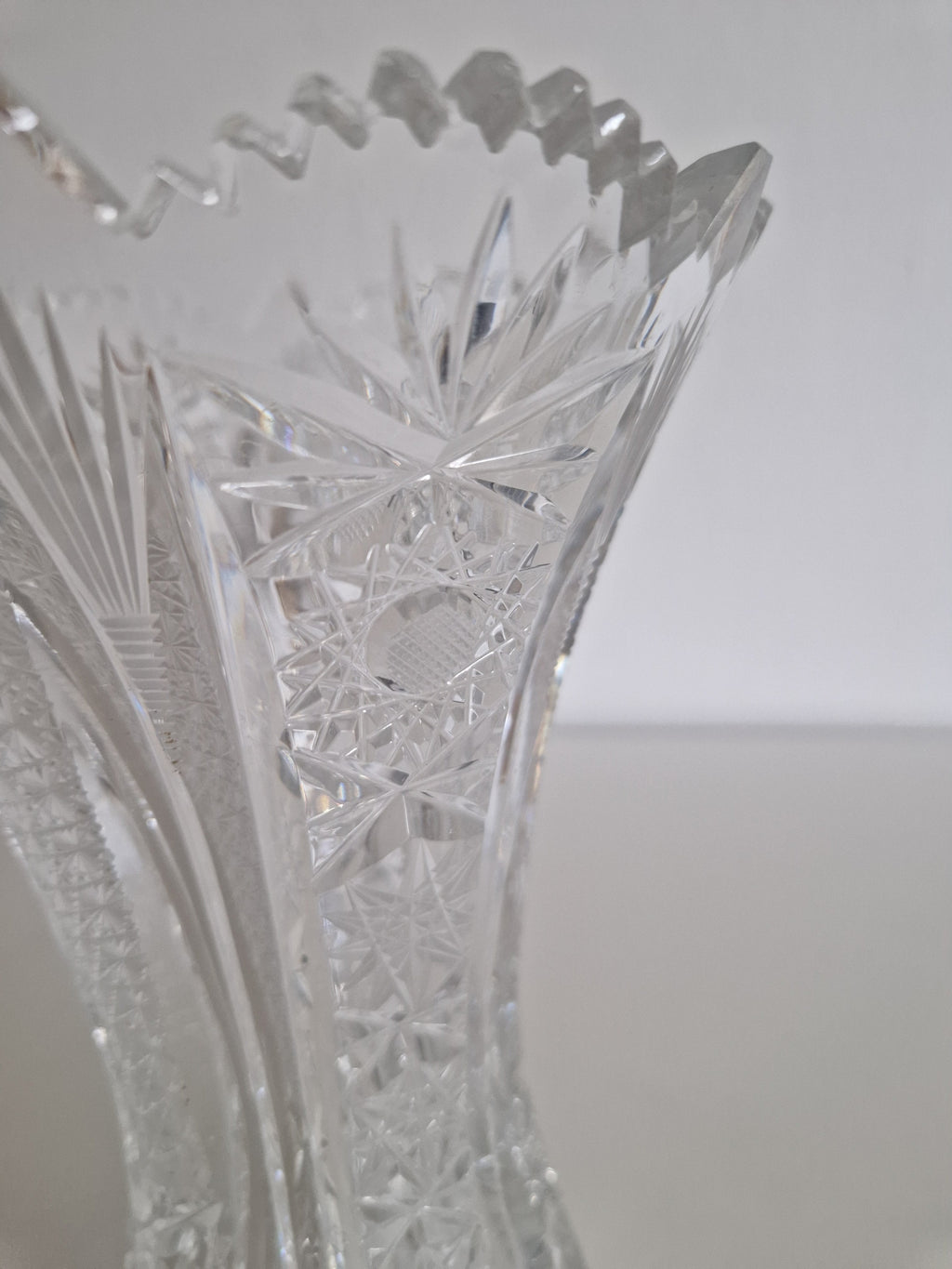 Vintage cut crystal vase — top view showing rim diameter approx. 14 cm and pinwheel star pattern