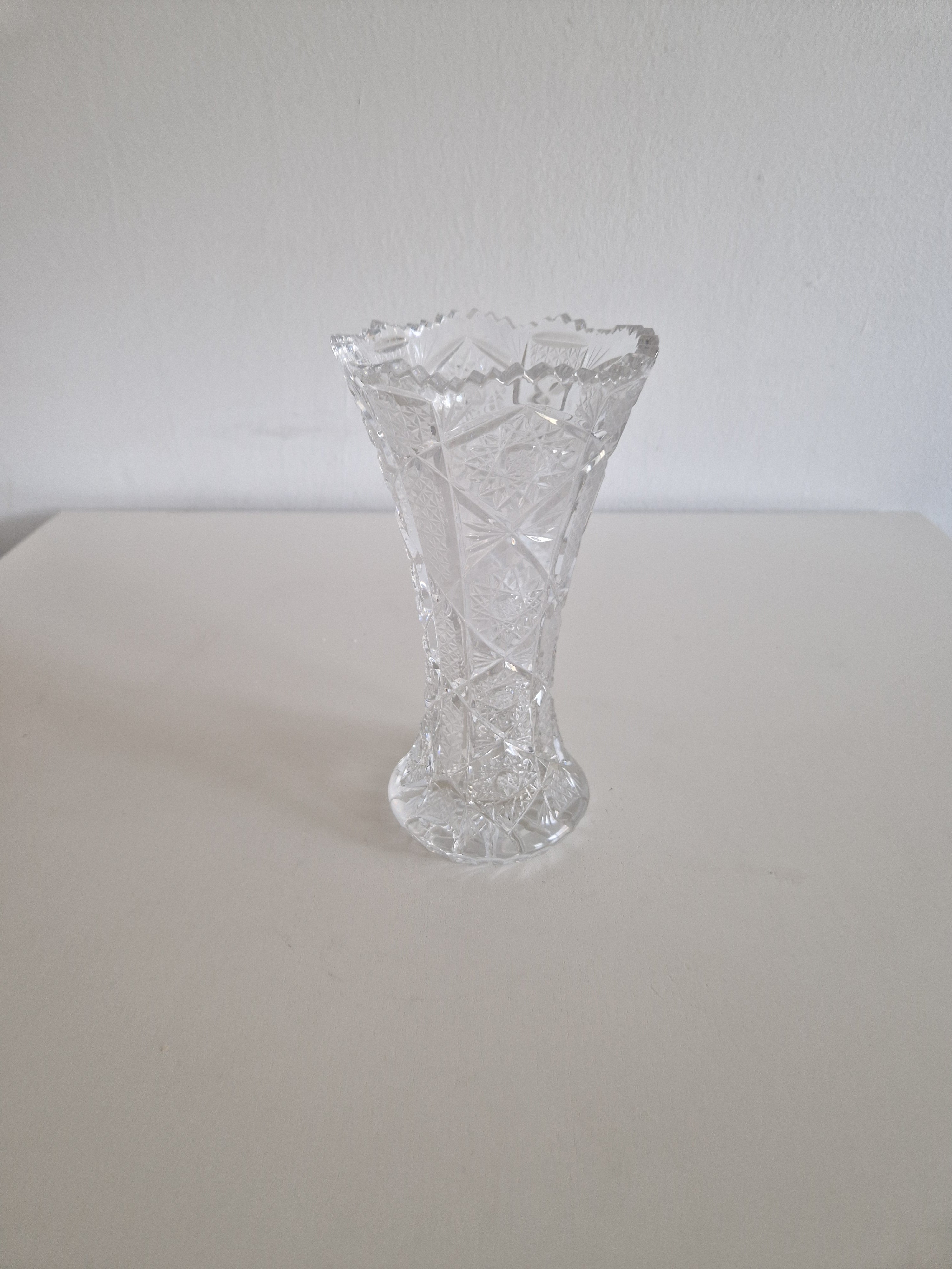Vintage cut crystal hourglass vase — side view with tape measure showing height approx. 18 cm