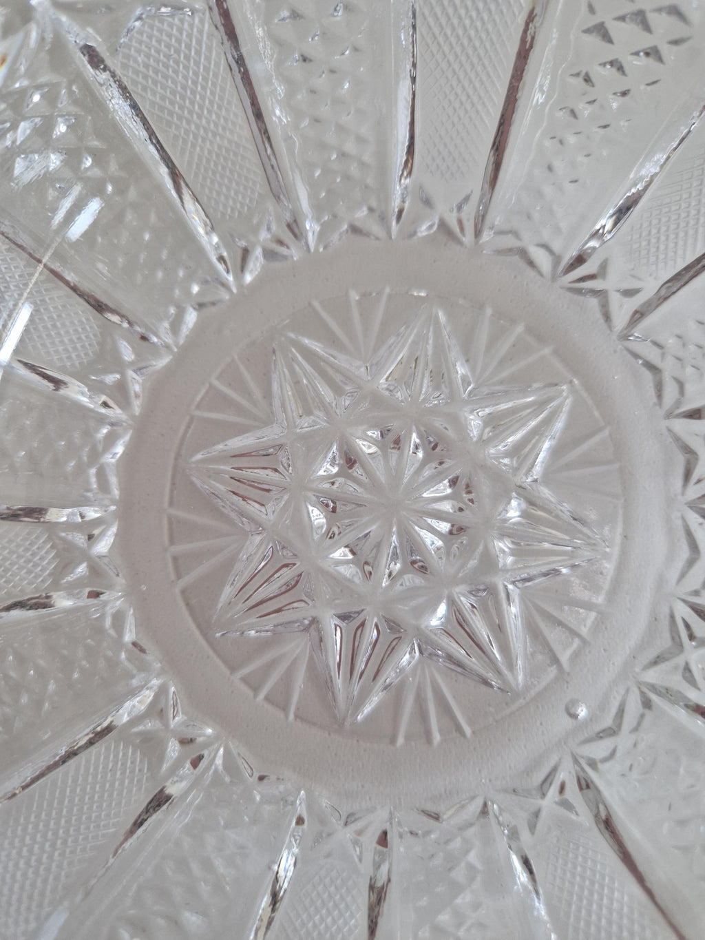 Vintage cut crystal bowl — top view showing star-cut base and fan panels, diameter approx. 18 cm