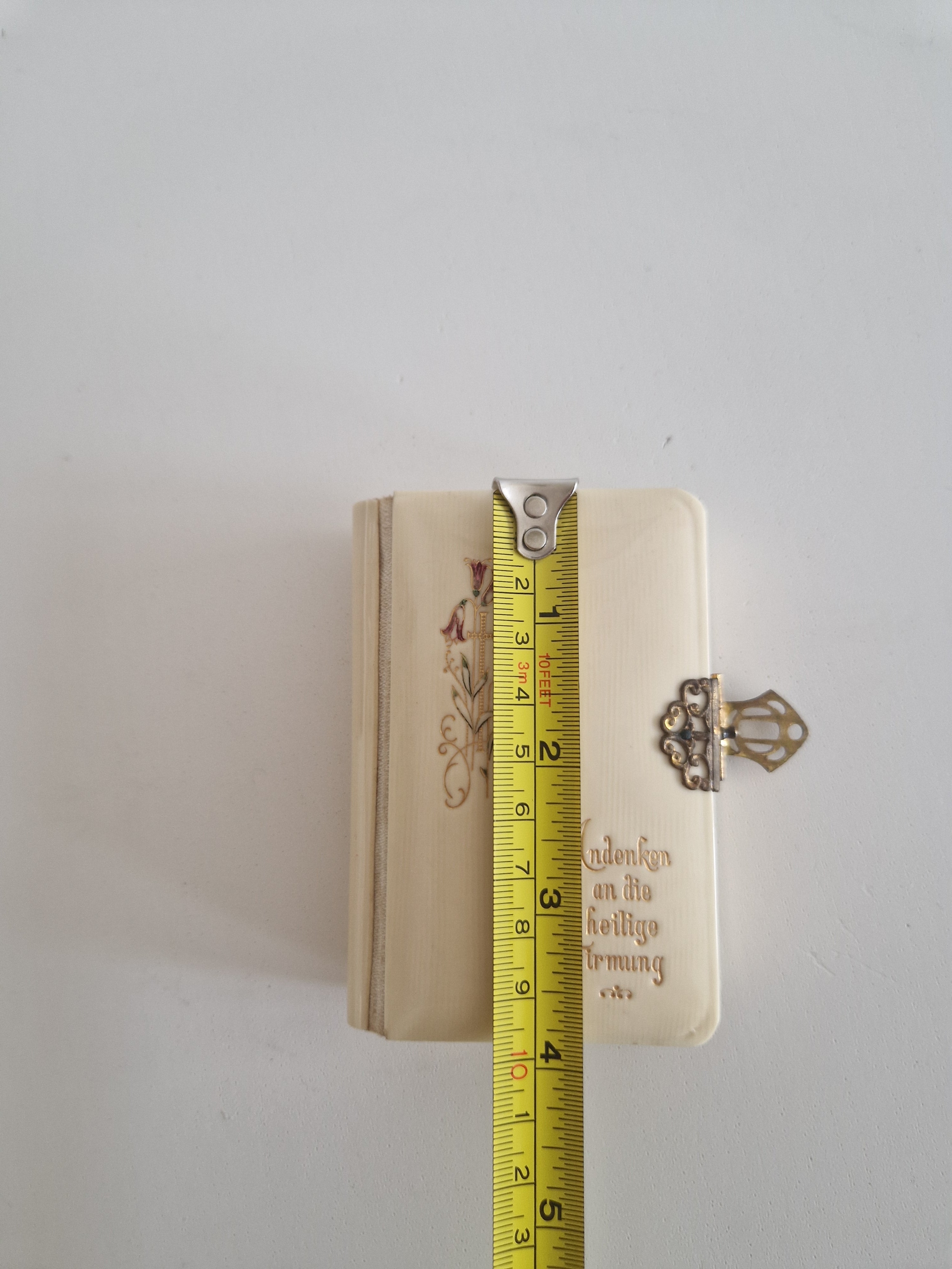 Antique prayer book — spine and gilt page edges with brass clasp detail, height approx. 10 cm