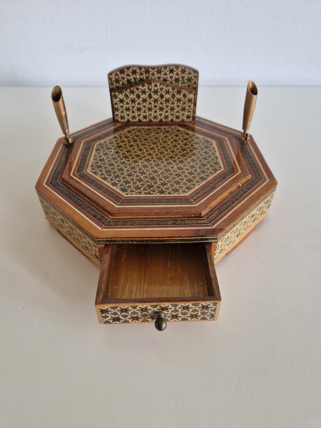 Close-up of pull-out drawer of Persian Khatam octagonal desk box