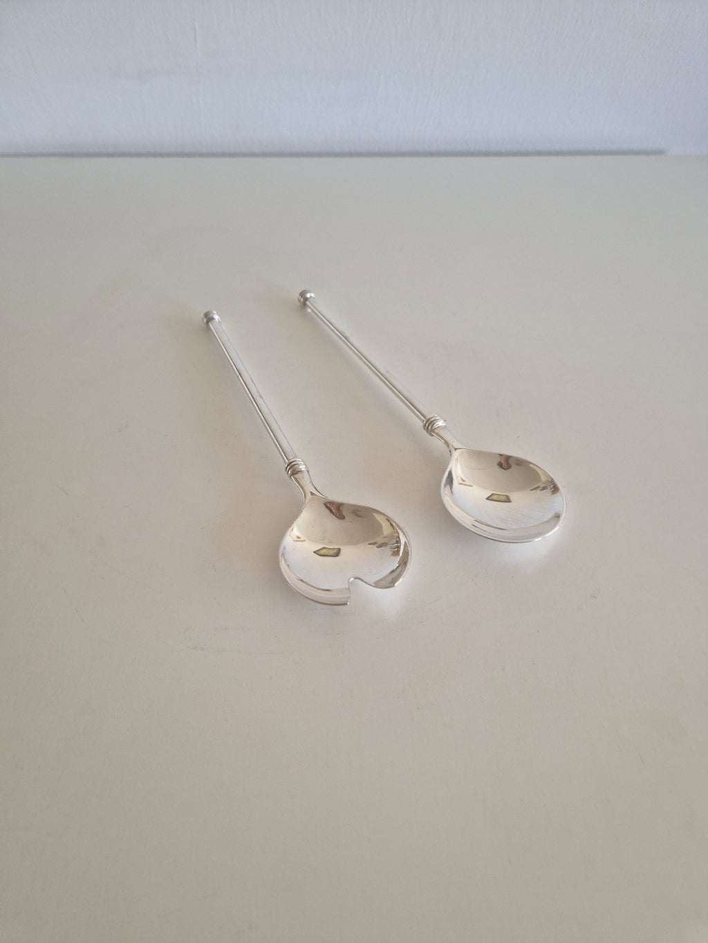 Vintage WMF silver-plated salad servers pair full view showing ball finial and round bowls
