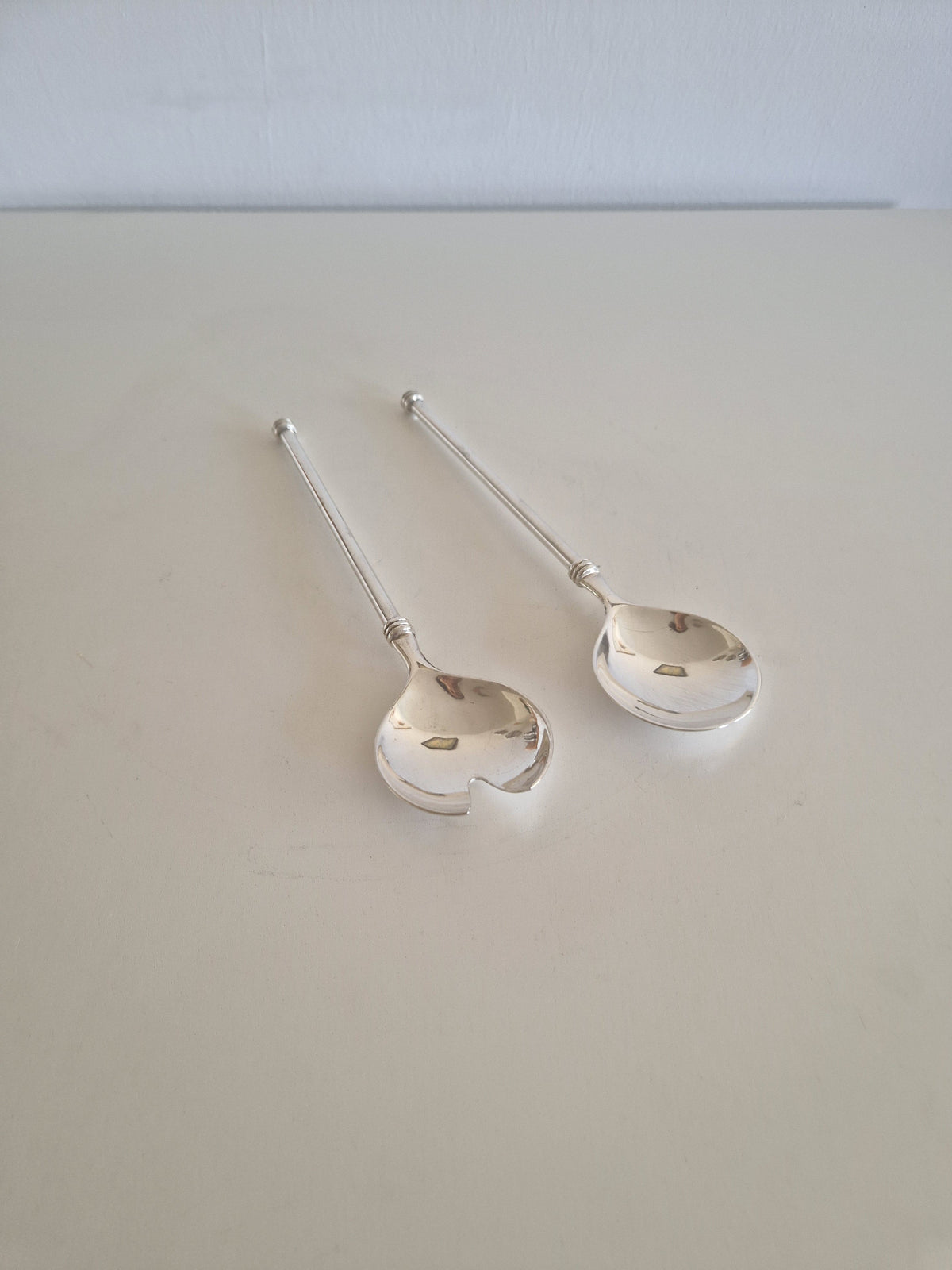 Vintage WMF silver-plated salad servers pair full view showing ball finial and round bowls
