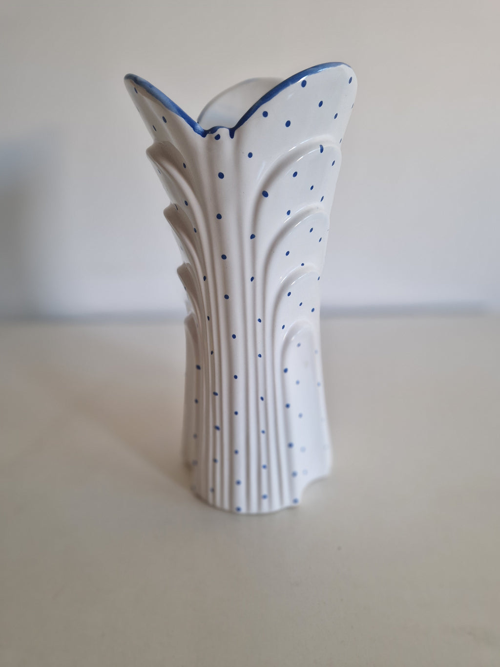 Vintage white porcelain vase with blue polka dots and scalloped edges