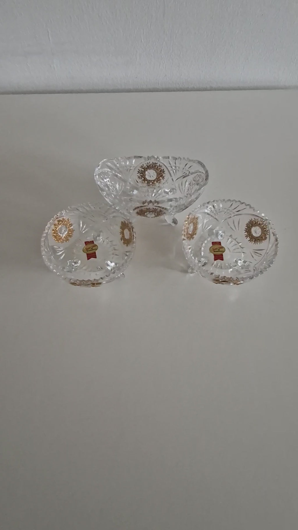 Set of Three Anna Hütte Cut Crystal Salt Cellars with Gold Sunburst Medallions — Made in Austria